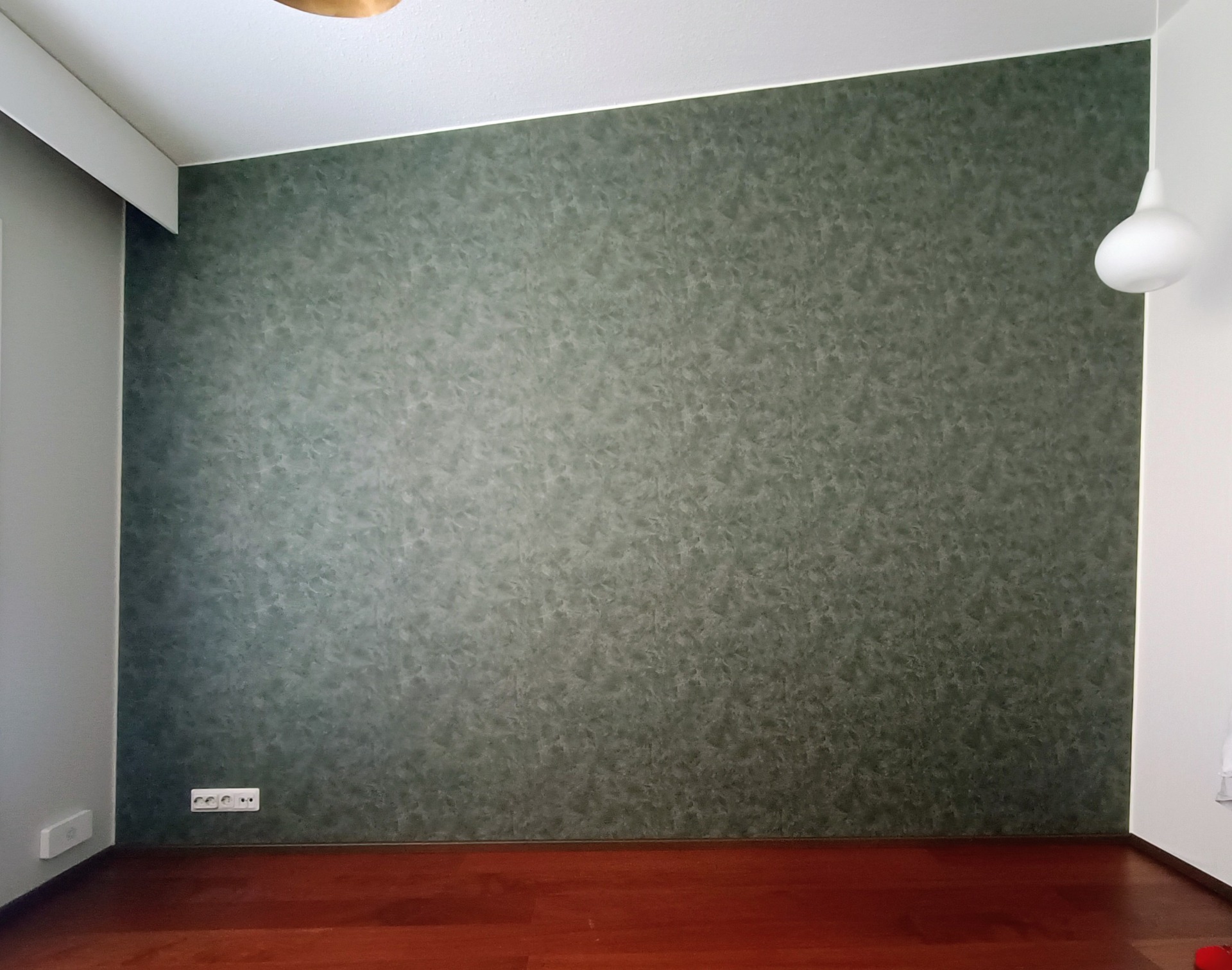 Tehosteseinä tapetilla